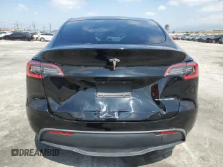 2020 Tesla Model Y Long Range with VIN 5YJYGDEE6LF051549, listed as a Copart auction lot 55063805 with 77,861 mi miles and Salvage Title. Bid and sale history available at DreamBid. Image 6.