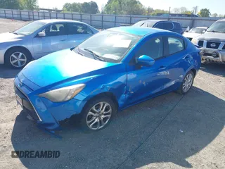 2016 Scion iA z VIN 3MYDLBZV9GY114065, wystawiony jako IAAI lot #42002937 z przebiegiem 187 582 mil mil oraz . Historia ofert i sprzedaży dostępna na DreamBid. Obrazek 2.