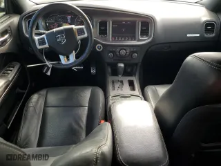 2013 Dodge Charger RT Plus with VIN 2C3CDXCT6DH652577, listed as a Copart auction lot 52120025 with 106,614 mi miles and Salvage Title. Bid and sale history available at carsss.com. Image 8.