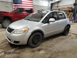 2011 Suzuki SX4 Crossover z VIN JS2YB5A31B6302809, wystawiony jako Copart lot #56519745 z przebiegiem 148 870 mil mil oraz Czysty tytuł • Clean title. Historia ofert i sprzedaży dostępna na DreamBid. Obrazek 1.
