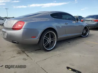 2006 Bentley Continental GT GT z VIN SCBCR63W76C037174, wystawiony jako Copart lot #79240794 z przebiegiem 103 577 mil mil oraz Nie do naprawy. Historia ofert i sprzedaży dostępna na DreamBid. Obrazek 3.