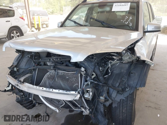 2013 Mercedes-Benz GLK 350 with VIN WDCGG8JB9DG025673, listed as a IAAI auction lot 42104497 with 164,583 mi miles and . Bid and sale history available at DreamBid. Image 6.