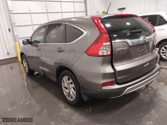 2015 Honda CR-V EX with VIN 3CZRM3H54FG712264, listed as a IAAI auction lot 41619854 with 119,077 mi miles. Bid and sale history available at carsss.com. Image 3.
