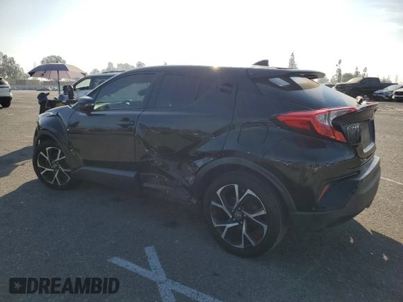 2018 Toyota C-HR XLE with VIN NMTKHMBX7JR022593, listed as a Copart auction lot 70659634 with 106,692 mi miles and Salvage Title. Bid and sale history available at carsss.com. Image 2.