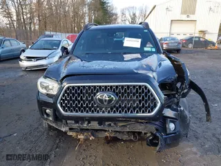 2019 Toyota Tacoma 4WD SR with VIN 3TMCZ5AN0KM261364, listed as a IAAI auction lot 41845950 with 85,230 mi miles. Bid and sale history available at carsss.com. Image 12.