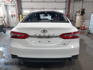 2019 Toyota Camry LE with VIN 4T1B11HK4KU853137, listed as a IAAI auction lot 41633785 with 67,629 mi miles and . Bid and sale history available at DreamBid. Image 16.