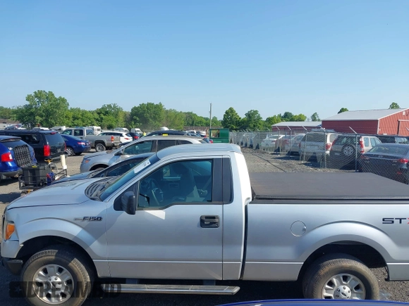 2011 Ford F-150 XL with VIN 1FTMF1EM6BFC33849, listed as a IAAI auction lot 42532968 with 121,018 mi miles and . Bid and sale history available at DreamBid. Image 14.