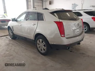 2014 Cadillac SRX Luxury Collection z VIN 3GYFNEE35ES681424, wystawiony jako IAAI lot #41854969 z przebiegiem 135 163 mil mil oraz . Historia ofert i sprzedaży dostępna na DreamBid. Obrazek 3.