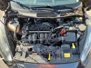 2015 Ford Fiesta SE z VIN 3FADP4BJ2FM161312, wystawiony jako Copart lot #59104495 z przebiegiem 110 583 mil mil oraz Szkoda całkowita • Salvage title. Historia ofert i sprzedaży dostępna na DreamBid. Obrazek 11.