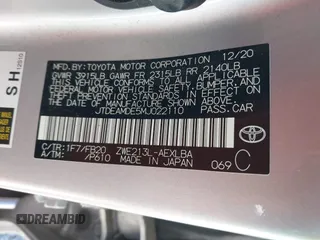 2021 Toyota Corolla Hybrid LE with VIN JTDEAMDE5MJ022110, listed as a IAAI auction lot 41912920 with 59,198 mi miles. Bid and sale history available at carsss.com. Image 9.