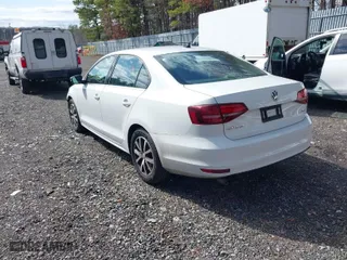 2017 Volkswagen Jetta 1.4T SE with VIN 3VWDB7AJXHM415912, listed as a IAAI auction lot 41735408 with 123,540 mi miles. Bid and sale history available at carsss.com. Image 3.
