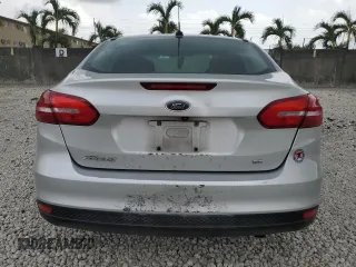2018 Ford Focus SE with VIN 1FADP3F28JL256318, listed as a Copart auction lot 55524544 with 136,723 mi miles and Salvage title. Bid and sale history available at DreamBid. Image 6.