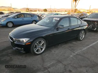2014 BMW 3 Series 328i with VIN WBA3C1C52EK108680, listed as a Copart auction lot 79512294 with 73,045 mi miles and Salvage Title. Bid and sale history available at carsss.com. Image 1.
