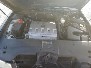2001 Cadillac Seville Touring STS z VIN 1G6KY549X1U282930, wystawiony jako Copart lot #72750504 z przebiegiem Nie podano mil oraz Szkoda całkowita • Salvage title. Historia ofert i sprzedaży dostępna na DreamBid. Obrazek 11.