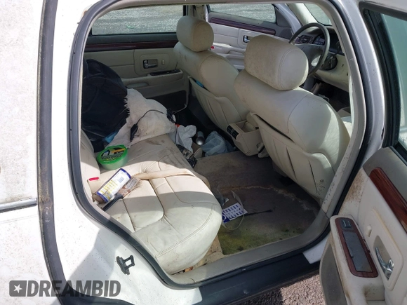 1999 Cadillac DeVille z VIN 1G6KD54Y5XU780836, wystawiony jako IAAI lot #41986180 z przebiegiem Nie podano mil oraz . Historia ofert i sprzedaży dostępna na DreamBid. Obrazek 8.