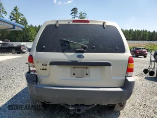 2004 Ford Escape XLT with VIN 1FMCU03134KB53192, listed as a Copart auction lot 62178075 with 223,637 mi miles and Salvage title. Bid and sale history available at DreamBid. Image 6.
