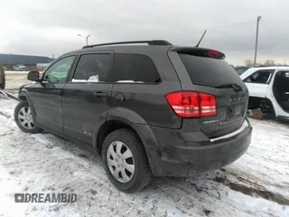 2016 Dodge Journey SE with VIN 3C4PDCAB0GT164835, listed as a IAAI auction lot 41093557 with 124,866 mi miles and . Bid and sale history available at DreamBid. Image 3.