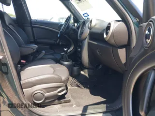2011 MINI Countryman S with VIN WMWZC5C53BWM10484, listed as a IAAI auction lot 42250690 with 113,534 mi miles and . Bid and sale history available at DreamBid. Image 5.