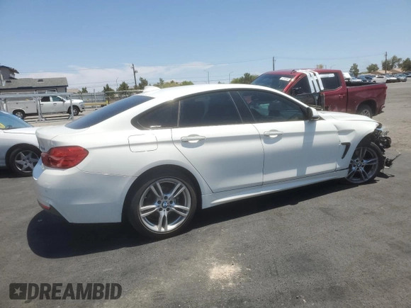 2015 BMW 4 Series 428i xDrive with VIN WBA4C9C50FG135058, listed as a Copart auction lot 60287555 with 86,809 mi miles and Salvage title. Bid and sale history available at DreamBid. Image 3.