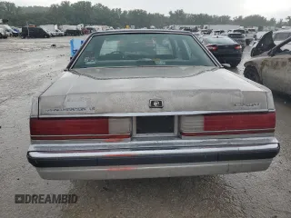 1991 Mercury Grand Marquis z VIN 2MECM75F9MX641760, wystawiony jako Copart lot #59421315 z przebiegiem 47 764 mil mil oraz Czysty tytuł • Clean title. Historia ofert i sprzedaży dostępna na DreamBid. Obrazek 6.
