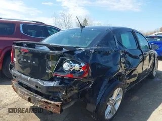 2013 Dodge Avenger SXT with VIN 1C3CDZCB0DN620279, listed as a IAAI auction lot 42094597 with 129,140 mi miles and . Bid and sale history available at DreamBid. Image 4.