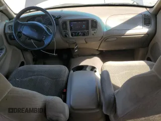 2000 Ford F-150 XL z VIN 1FTRX18L5YNA10836, wystawiony jako Copart lot #55325245 z przebiegiem 188 237 mil mil oraz Szkoda całkowita • Salvage title. Historia ofert i sprzedaży dostępna na DreamBid. Obrazek 8.