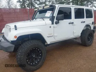 2014 Jeep Wrangler Unlimited Sahara z VIN 1C4BJWEG6EL245986, wystawiony jako IAAI lot #41498492 z przebiegiem 125 882 mil mil oraz . Historia ofert i sprzedaży dostępna na DreamBid. Obrazek 18.