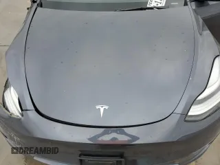 2023 Tesla Model Y Long Range with VIN 7SAYGDEE3PA151887, listed as a Copart auction lot 51459495 with 15,562 mi miles and Salvage Title. Bid and sale history available at DreamBid. Image 13.