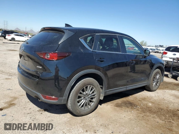 2017 Mazda CX-5 Touring z VIN JM3KFBCL4H0184922, wystawiony jako Copart lot #50166195 z przebiegiem 86 270 mil mil oraz Szkoda całkowita • Salvage title. Historia ofert i sprzedaży dostępna na DreamBid. Obrazek 3.