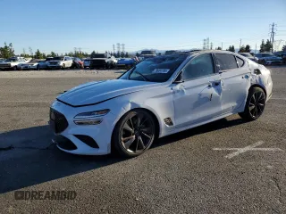 2022 Genesis G70 3.3T with VIN KMTG54TE9NU081984, listed as a Copart auction lot 79634704 with 63,169 mi miles and Salvage Title. Bid and sale history available at DreamBid. Image 1.