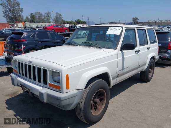 2000 Jeep Cherokee z VIN 1J4FT48S8YL214074, wystawiony jako IAAI lot #42577235 z przebiegiem 287 868 mil mil oraz . Historia ofert i sprzedaży dostępna na DreamBid. Obrazek 2.
