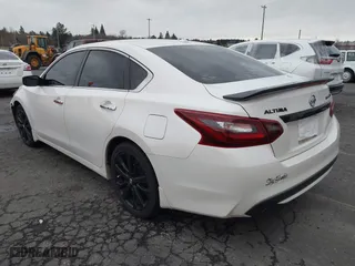 2018 Nissan Altima 2.5 SV with VIN 1N4AL3AP4JC158095, listed as a IAAI auction lot 41155838 with 79,504 mi miles. Bid and sale history available at carsss.com. Image 3.