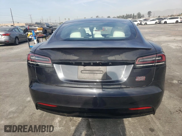 2023 Tesla Model S Plaid с VIN 5YJSA1E67PF528820, выставлен на аукционе Copart как лот 83111464 с пробегом 17 858 миль миль и Списание • Salvage title. История ставок и продаж доступна на DreamBid. Изображение 6.