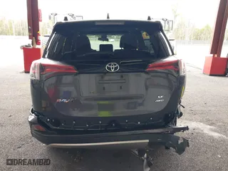 2016 Toyota RAV4 SE with VIN JTMJFREV7GJ072488, listed as a IAAI auction lot 42031254 with 106,901 mi miles. Bid and sale history available at carsss.com. Image 16.