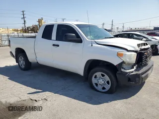 2015 Toyota Tundra SR z VIN 5TFRM5F13FX093914, wystawiony jako Copart lot #58087635 z przebiegiem 128 685 mil mil oraz Szkoda całkowita • Salvage title. Historia ofert i sprzedaży dostępna na DreamBid. Obrazek 4.