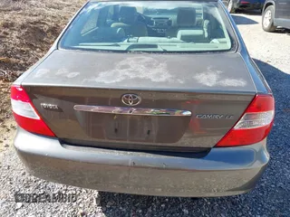 2004 Toyota Camry LE with VIN 4T1BE32K54U904138, listed as a IAAI auction lot 41792208 with 217,829 mi miles and . Bid and sale history available at carsss.com. Image 13.