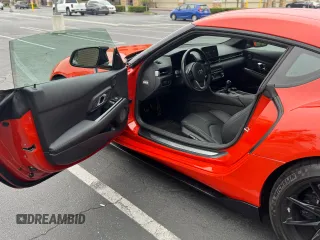 2024 Toyota Supra 3.0 z VIN WZ1DB0G09RW063546, wystawiony jako Copart lot #67269555 z przebiegiem 5 150 mil mil oraz Szkoda całkowita • Salvage title. Historia ofert i sprzedaży dostępna na DreamBid. Obrazek 6.