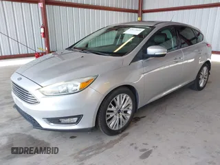2017 Ford Focus Titanium z VIN 1FADP3N2XHL288103, wystawiony jako IAAI lot #42573844 z przebiegiem 128 952 mil mil oraz . Historia ofert i sprzedaży dostępna na DreamBid. Obrazek 18.