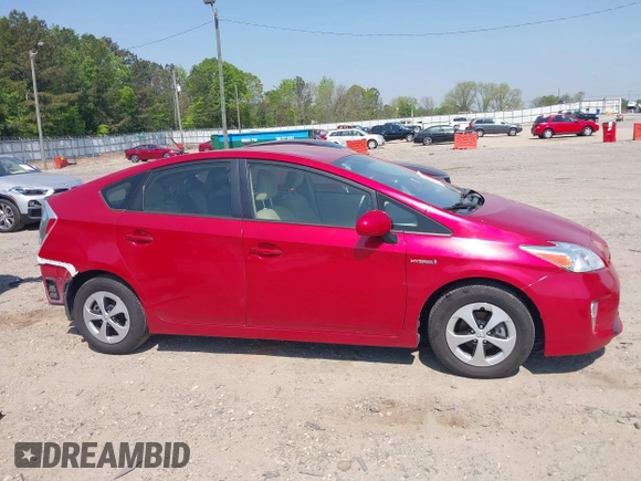 2015 Toyota Prius Four with VIN JTDKN3DU6F1883985, listed as a IAAI auction lot 42072673 with 129,117 mi miles and . Bid and sale history available at DreamBid. Image 14.