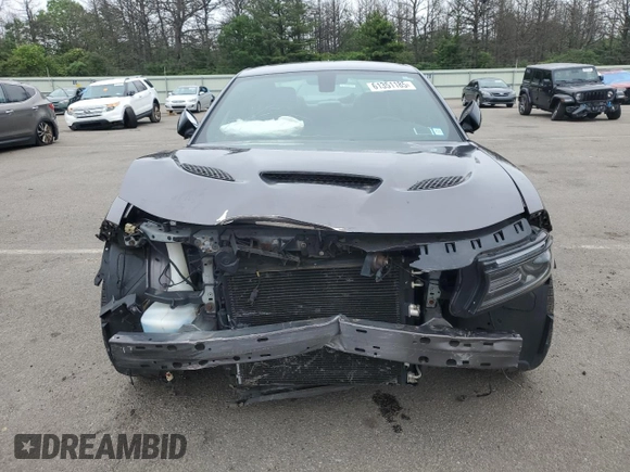 2016 Dodge Charger R/T with VIN 2C3CDXCT3GH298103, listed as a Copart auction lot 61351185 with 61,648 mi miles and Salvage title. Bid and sale history available at DreamBid. Image 5.