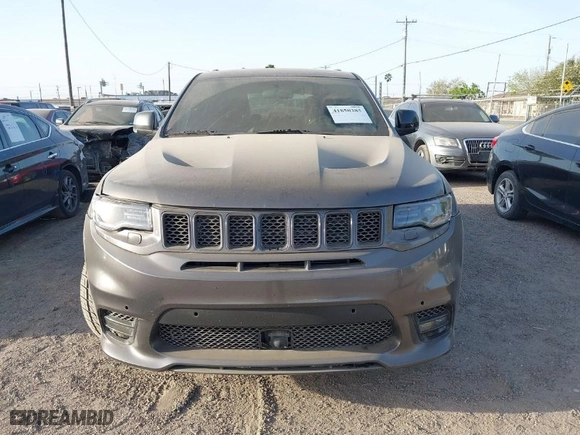 2015 Jeep Grand Cherokee SRT with VIN 1C4RJFDJ9FC842448, listed as a IAAI auction lot 41850385 with 178,439 mi miles. Bid and sale history available at carsss.com. Image 12.