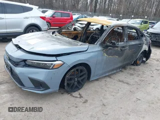 2022 Honda Civic Sport with VIN 2HGFE2F5XNH553141, listed as a IAAI auction lot 41610028 with Not Provided miles and . Bid and sale history available at DreamBid. Image 2.