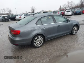 2015 Volkswagen Jetta SE with VIN 3VWD07AJ4FM306977, listed as a IAAI auction lot 41719328 with 105,680 mi miles and . Bid and sale history available at DreamBid. Image 4.
