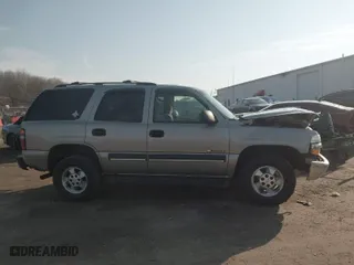 2003 Chevrolet Tahoe LS with VIN 1GNEK13V03J154985, listed as a IAAI auction lot 41708954 with 203,826 mi miles. Bid and sale history available at carsss.com. Image 13.