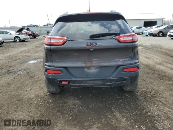 2018 Jeep Cherokee Trailhawk with VIN 1C4PJMBB0JD561309, listed as a Copart auction lot 51487065 with 105,138 mi miles and Salvage title. Bid and sale history available at DreamBid. Image 6.