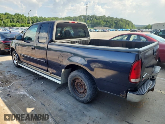 1999 Ford F-150 with VIN 1FTZX1729XNB58298, listed as a Copart auction lot 62369755 with 165,150 mi miles and Clean title. Bid and sale history available at DreamBid. Image 2.