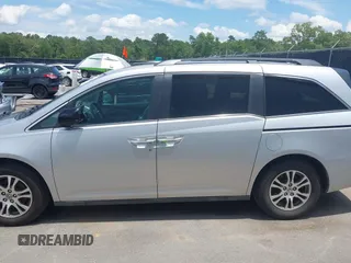 2012 Honda Odyssey EX-L with VIN 5FNRL5H65CB076534, listed as a IAAI auction lot 42440258 with 150,866 mi miles and . Bid and sale history available at DreamBid. Image 15.