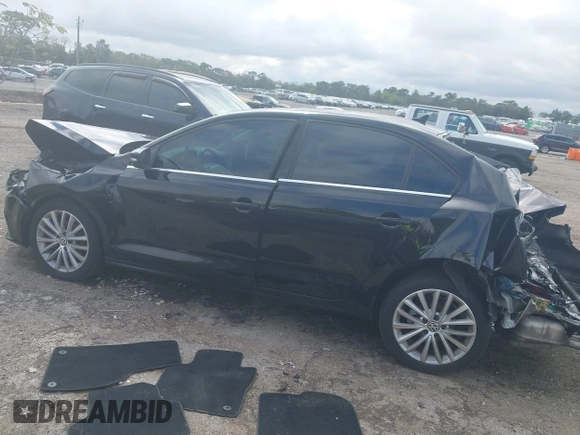 2016 Volkswagen Jetta Sedan 1.8T SEL with VIN 3VWL07AJ9GM258065, listed as a IAAI auction lot 41617182 with 164,891 mi miles. Bid and sale history available at carsss.com. Image 14.