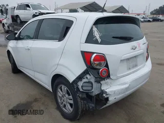 2012 Chevrolet Sonic LT with VIN 1G1JC6SH3C4143595, listed as a IAAI auction lot 40617924 with 156,246 mi miles and . Bid and sale history available at DreamBid. Image 6.