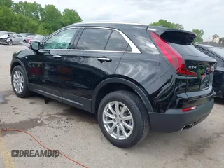 2021 Cadillac XT4 FWD Luxury with VIN 1GYAZAR44MF004295, listed as a IAAI auction lot 42196752 with 69,311 mi miles and . Bid and sale history available at DreamBid. Image 3.
